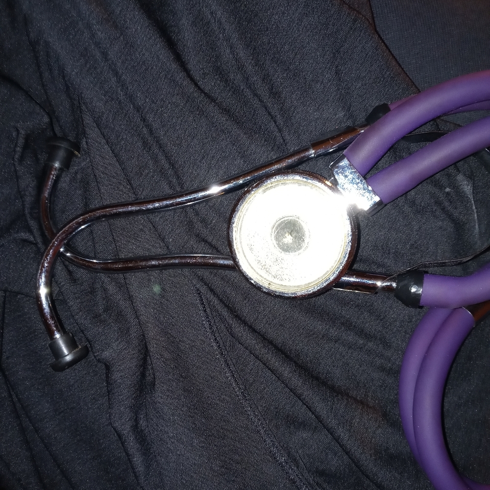 Brand new purple stethoscope and pressure cuff
